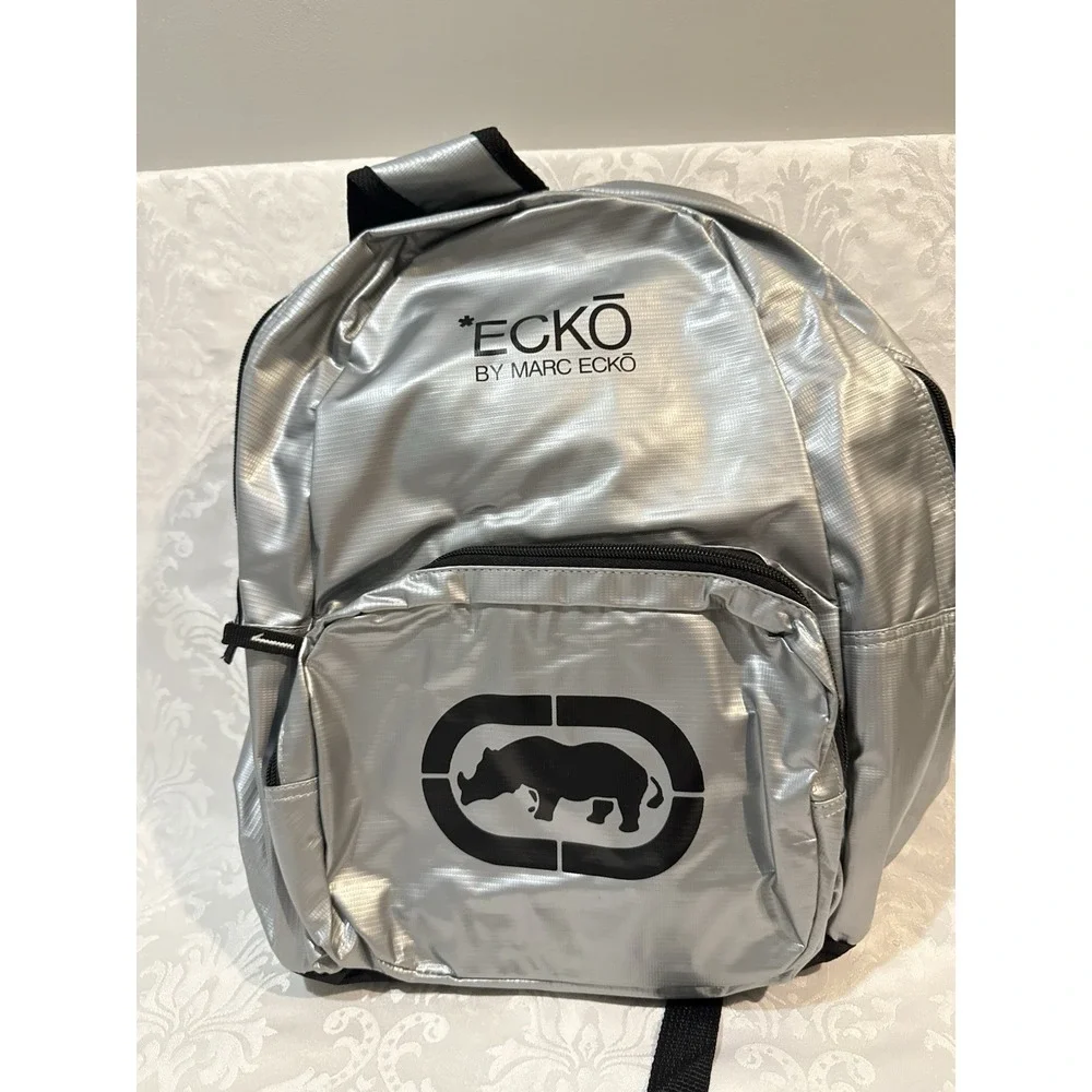Ecko by Marc Ecko silver metallic backpack iconic black rhino logo front pocket